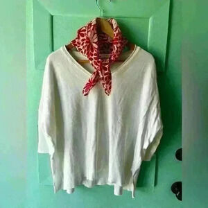 SURVIVAL - white oversized v-neck sweater, fitted elbow length sleeves. …
